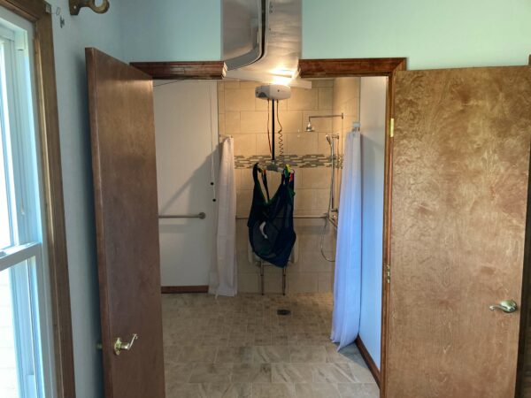 sah grant, hisa grant, veteran, aging in place, addition, bedroom remodel, bathroom remodel, custom tile shower, fold down shower bench, wheelchair accessible entry, ramp, ceiling lift, curbless shower, comfort height commode, roll under sink, vinton virginia