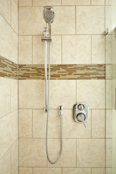custom tile curbless shower wheelchair accessible wood fold down seat grab bars aging in place bathroom roanoke virginia