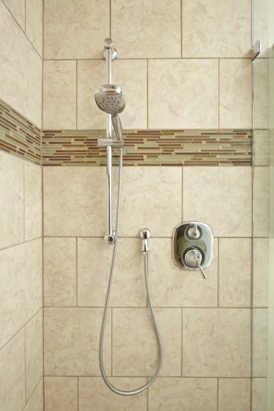 custom tile curbless shower wheelchair accessible wood fold down seat grab bars aging in place bathroom roanoke virginia